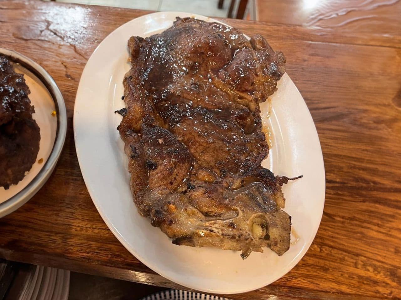 Imagen de Churrasco de cuadril encebollado con guarnicion